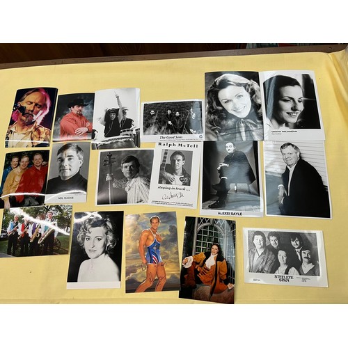 102 - A box of assorted press photographs.