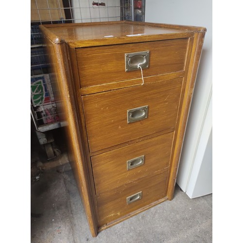 1001 - A mid 20th century chest of drawers with campaign style handles.