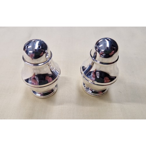 457 - Hallmarked silver salt & pepper pots, in presentation box, gross weight 76g.