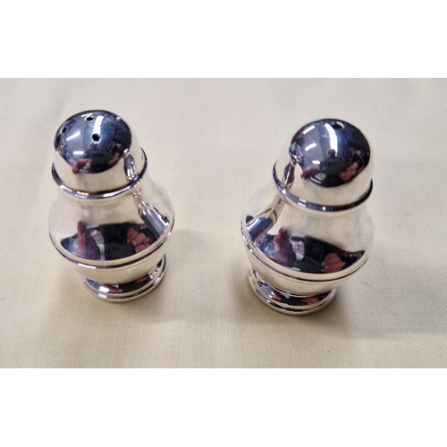 457 - Hallmarked silver salt & pepper pots, in presentation box, gross weight 76g.