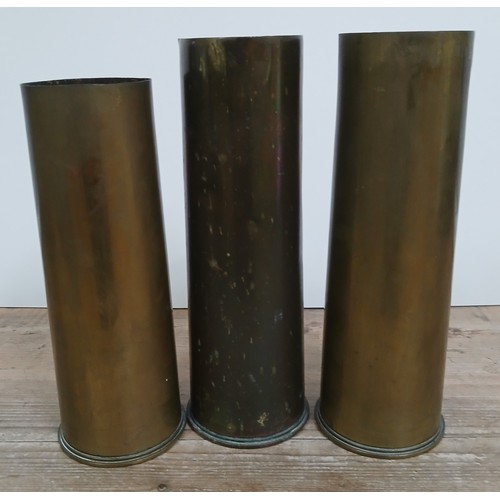 61 - A group of three WWI British brass 18 PDR shell cases, dated 1915, 1916 & 1917.