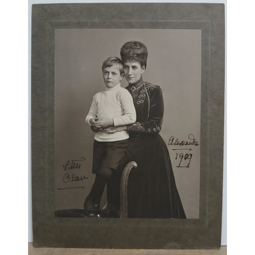 101 - Queen Alexandra with grandson Prince Olav, autographed full length photographic portrait, signed and... 