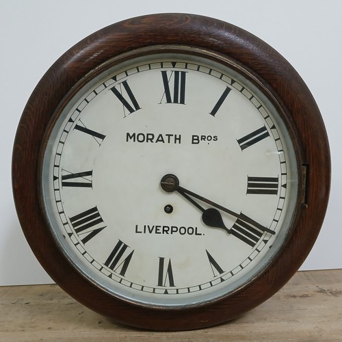 205 - A Morath Brothers oak fusee wall clock, diameter 39cm.