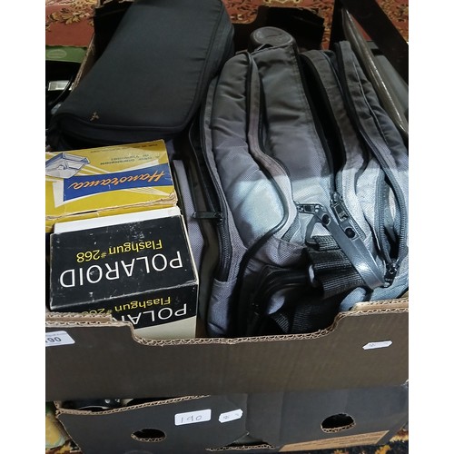 190 - Two boxes of assorted cameras and accessories.