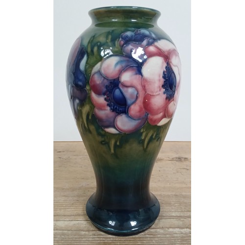 262 - A Moorcroft Anemone pottery vase, impressed and painte3d marks, height 26cm.