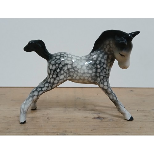 290 - A rare Beswick foal in 'Rocking Horse Grey', length 9cm.