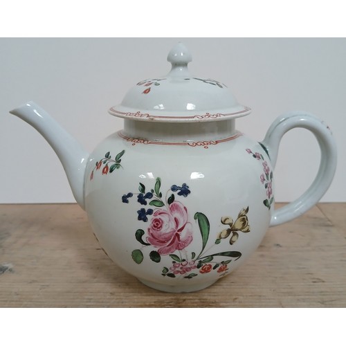 305 - A bow porcelain teapot circa 1760, decorated in floral over enamels, length 19cm.