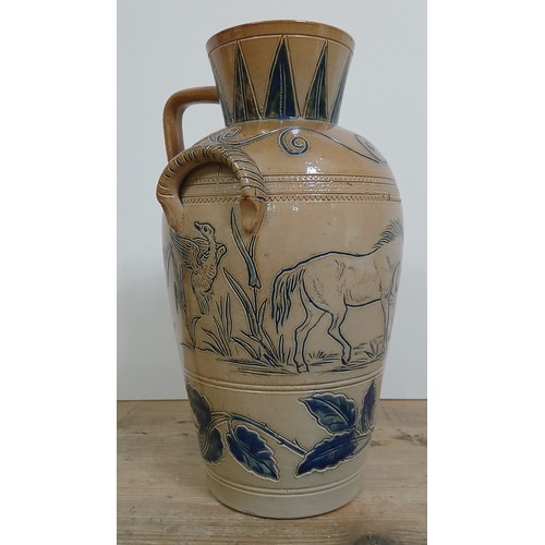 269 - A Doulton Lambeth stoneware ewer by Hannah Bolton Barlow, circa 1900, sgrafittio decoration depictin... 