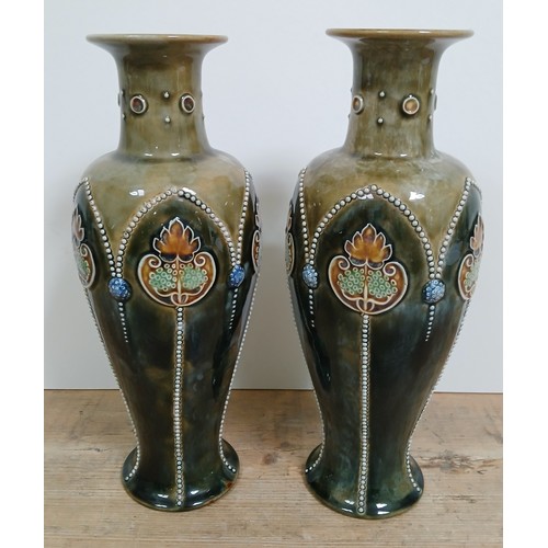 271 - A pair of Royal Doulton stoneware vases, pattern number 8426D, also inscribed 'MB', height 32cm.