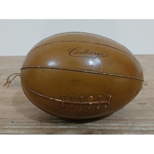 389 - A rare Cadbury's chocolate easter egg box modelled as a rugby ball, length 10cm.