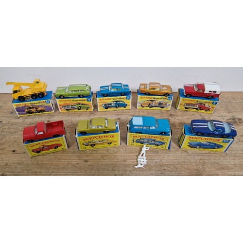 403 - Nine boxed Matchbox Superfast/series diecast models to include mercury commuter 73, dodge crane truc... 