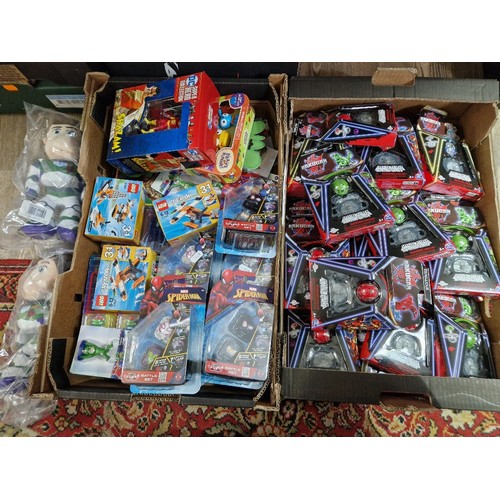 497 - Two boxes of assorted boxed toys to include special attack Trox Bakugan, Marvel Spiderman, Lego crea... 