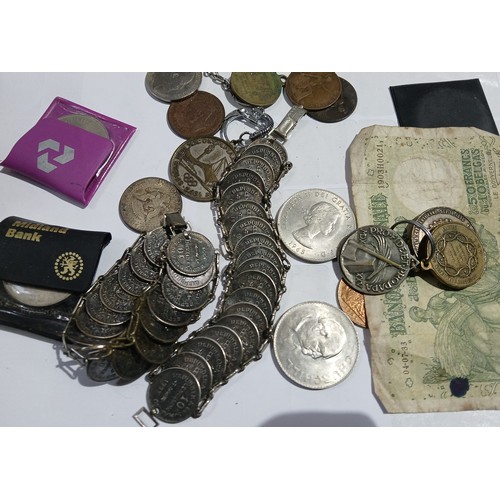 674 - Two coin bracelets and loose coins.