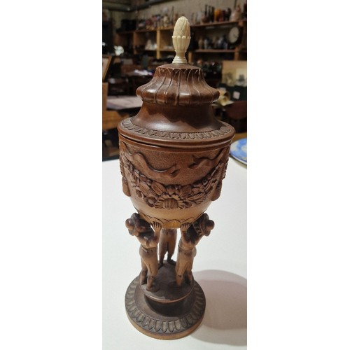 260G - A Bavarian carved wood lidded goblet, height 32cm.