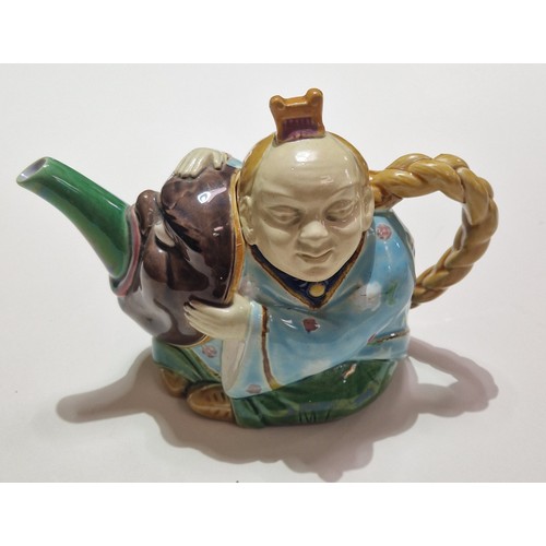 260D - A Minton 'Chinaman' tea pot, length 19cm.