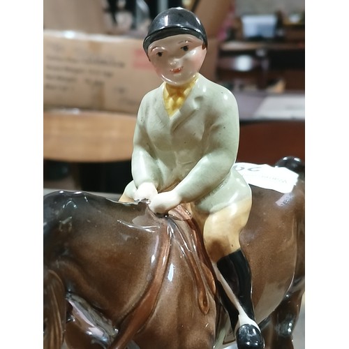 291 - A Beswick boy hunter, length 16cm.