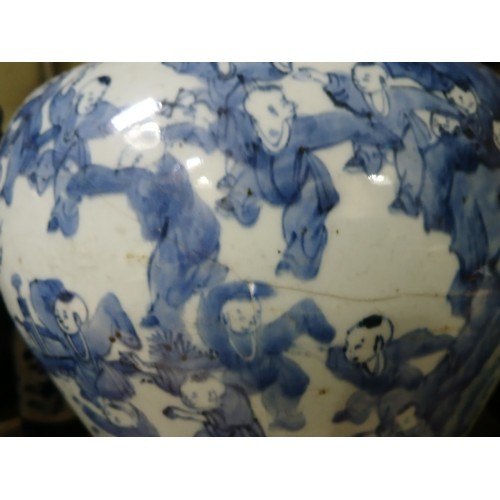 251 - A Chinese One Hundred Boys blue and white porcelain vase, 18th/19th century, height 32cm.