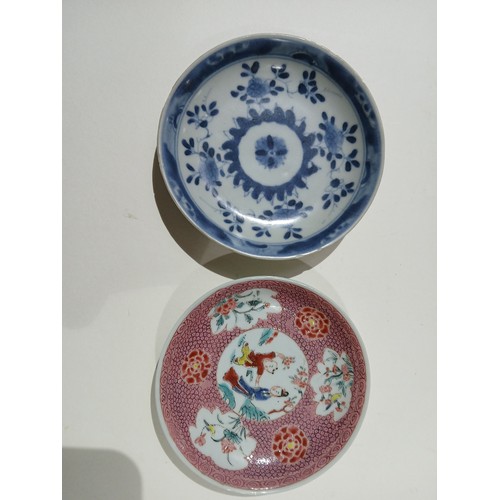 257 - A group of five Chinese porcelain tea bowls and saucers including Ca Mau ship wreck, and two others.