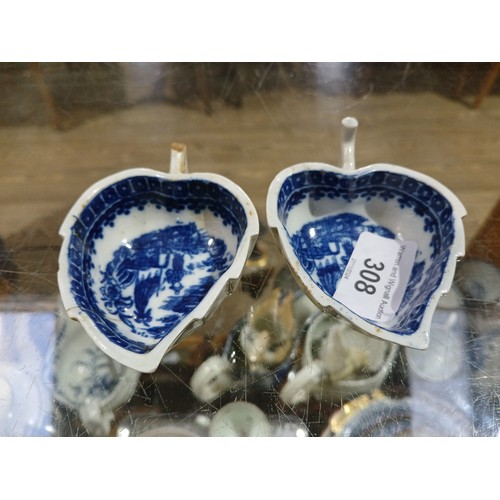 308 - A pair off English 18th century relief moulded blue and white porcelain dishes, of leaf form, the in... 