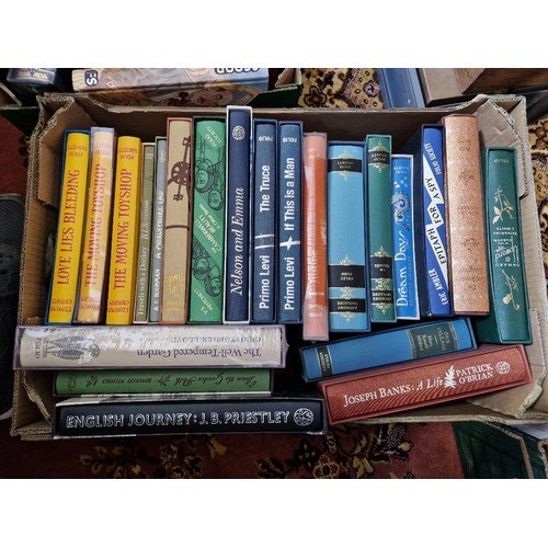 156 - Nine boxes of Folio Society titles, approximately 155 and another box of assorted books.