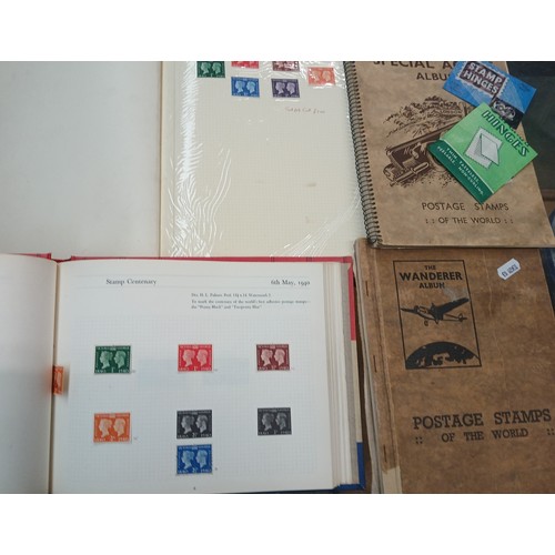 686 - Four stamp albums containing UK and World stamps.