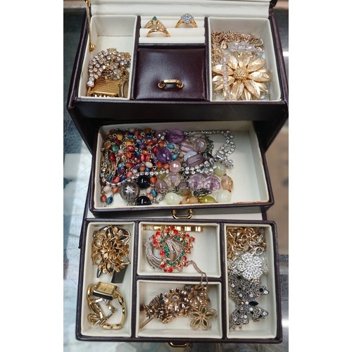 717 - A jewellery box with assorted costume jewellery