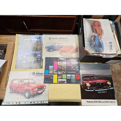 48 - A mixed lot comprising air show programmes, Air Force yearbooks, aviation prints catalogues, car bro... 