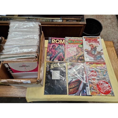 54 - A box of over 120 assorted comics.