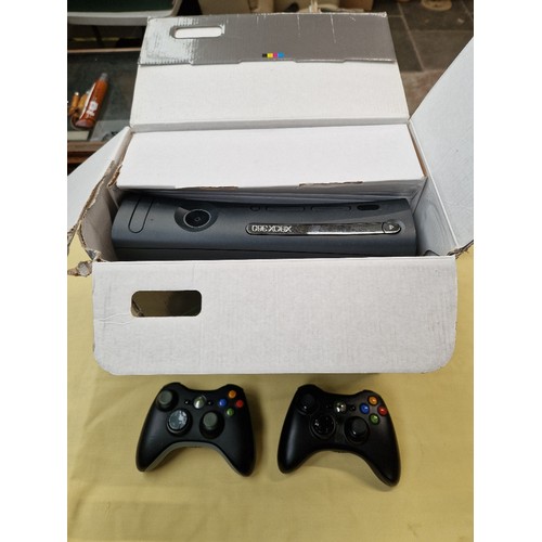 62 - An Xbox 360 with 2 controllers in original box.