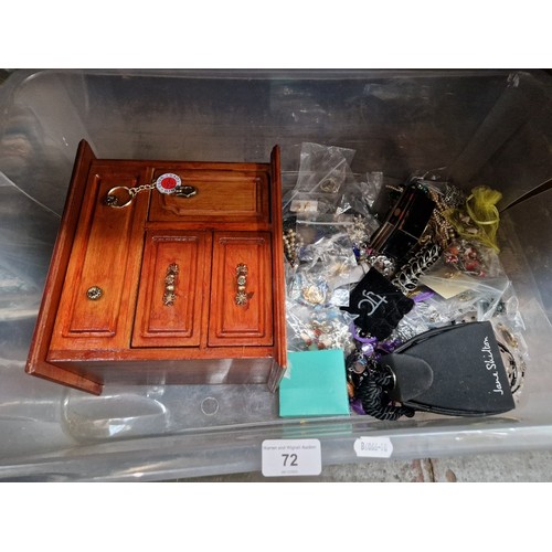 72 - A box of costume jewellery, pin badges Jane Shilton watch, jewellery box, Dinky Toys key ring, etc.