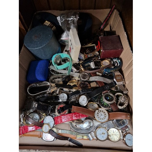 64 - A box of assorted watches to include D&G, Citizen & Michael Kors etc.