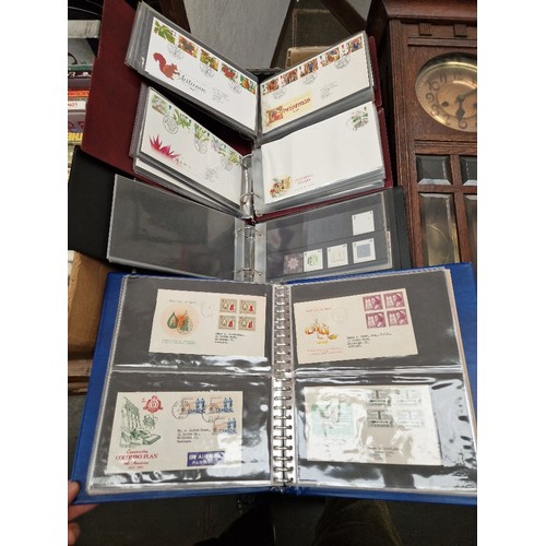 80 - 2 albums of GB FDC, an album of mint GB stamps together with an album of Canada FDC mainly from 1950... 