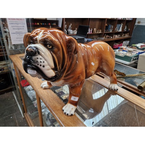 77 - A large bulldog figure by Italian Ceramiche Boxer, approx. 40cm height, 65cm length.