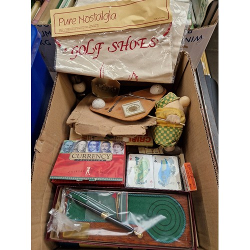 98 - A box of golfing related collectables including novelty desk stand, clock, silver plated liquor meas... 