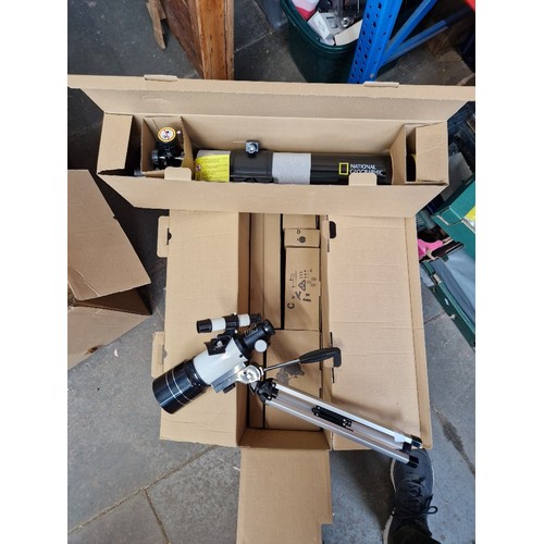 131 - A National Geographic telescope 76/700 (boxed and appears unused), together with another telescope a... 