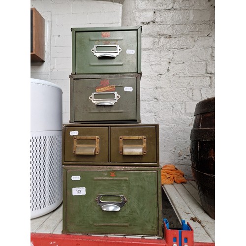 127 - Four separate metal filing drawers