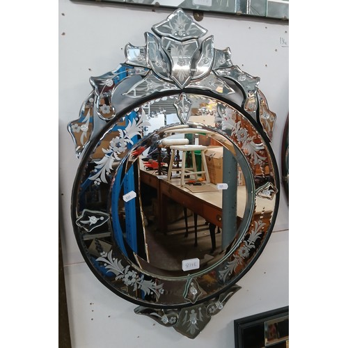 819E - A Venetian style etched glass wall mirror, 46cm x 69cm.