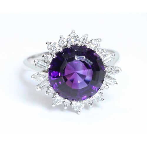 1 - AN 18CT WHITE GOLD AMETHYST AND VARI-CUT DIAMOND CLUSTER RING, the central round mixed cut amethyst ... 