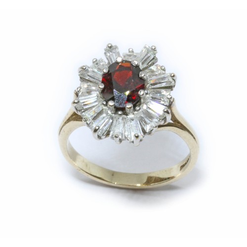 45 - A 9ct gold ballerina cluster ring, set with a central garnet surrounded by CZs, sponsor GJ, Birmingh... 