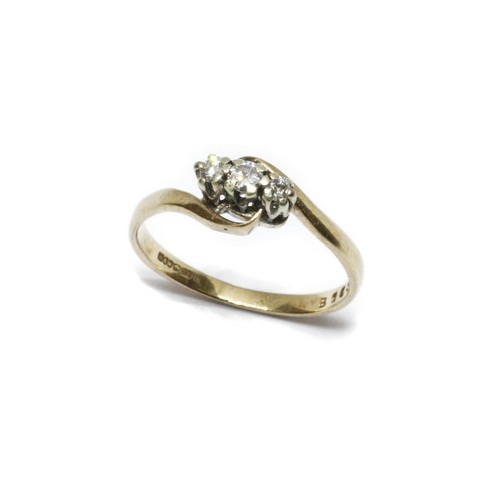 62 - A 9ct gold three stone diamond ring, sponsor H&M, 375 other marks rubbed, gross weight1.4g, size K.