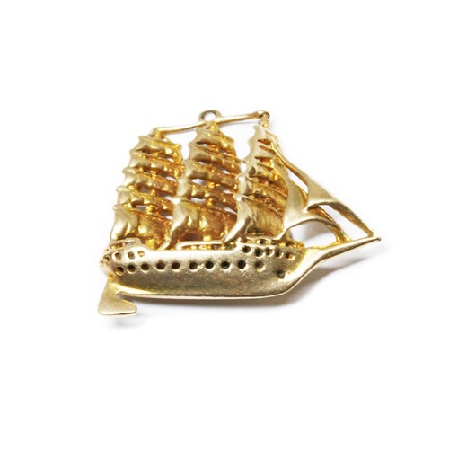 84 - A 9ct gold charm modelled as a galleon, sponsor indistinct, London 1961, length 32mm, weight 6.3g.