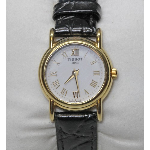 180 - A ladies 18ct gold Tissot wristwatch, with box and papers.