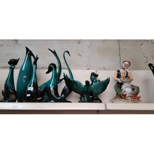 542 - Eight pieces of Blue Mountain pottery and a Capodimonte figure