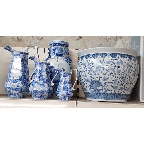 544 - Blue & white ceramics - large fish bowl (31cm diameter), set of 3 graduated jugs (tallest 27cm) and ... 