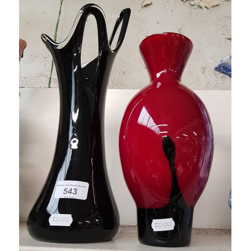 543 - An unusual vase from the Caithness ‘Ebony’ range - black glass cased in red approx 27cm high togethe... 