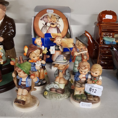 612 - Wall mounted musical box with Hummel image made in Switzerland and 7 Hummel figurines including Appl... 