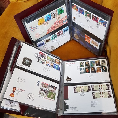 673 - Two folders of First Day Covers.