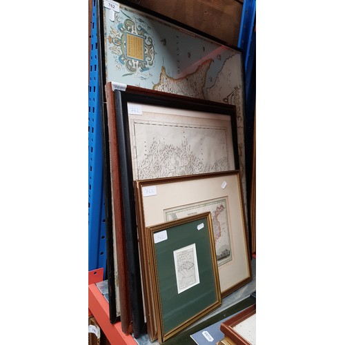 762 - Five various framed maps.