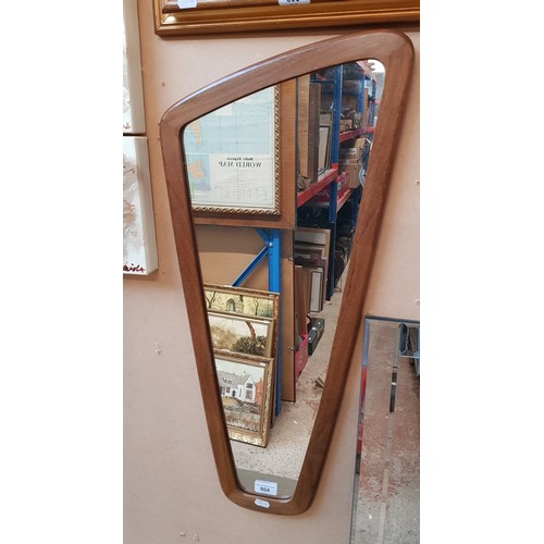 804 - A mid 20th century teak framed mirror, 34cm x 75cm (overall).