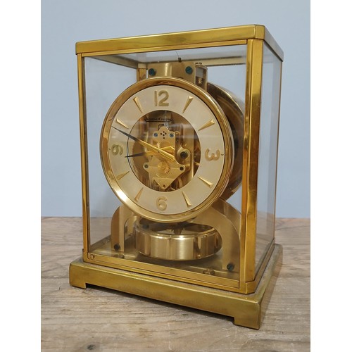 181 - A JAEGER-LECOULTRE ATMOS CLOCK, gilt brass and glass cased, number 89207, height 22cm.